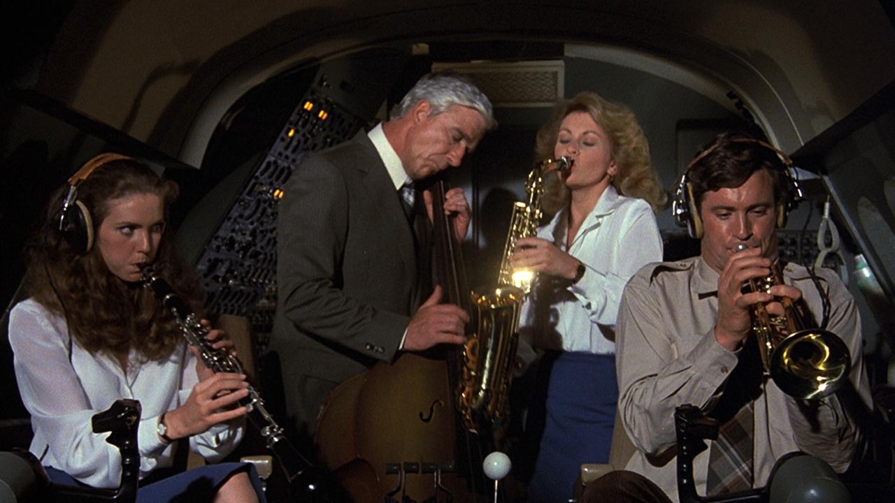 The crew playing instruments in the cockpit in 'Airplane!'
