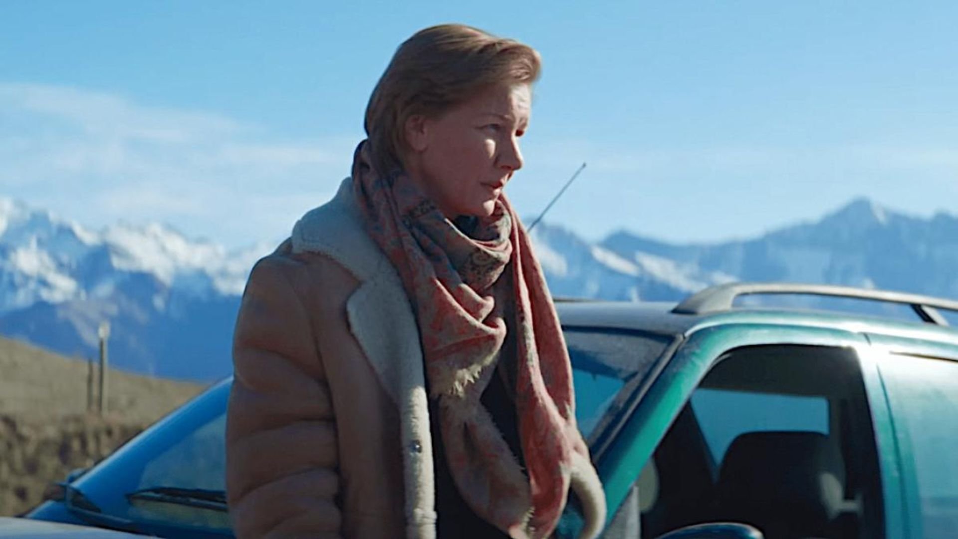 Sandra Hüller as Sandra Voyter leaning against a car in 'Anatomy of a Fall,' 7 Great Oscar Nominated Scripts You Should Read 