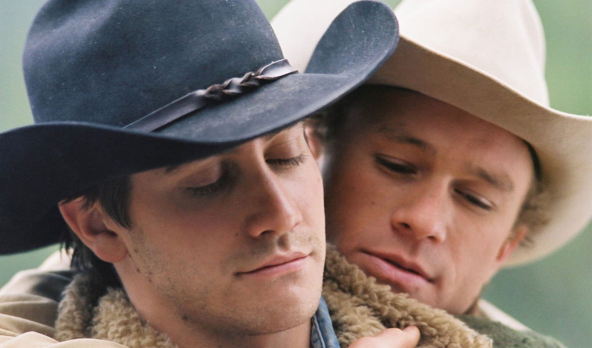 Ennis Del Mar (Heath Ledger) and Jack Twist (Jake Gyllenhaal) hugging each other in 'Brokeback Mountain,' How to Write a Short Story: 7 Elements to Always Remember