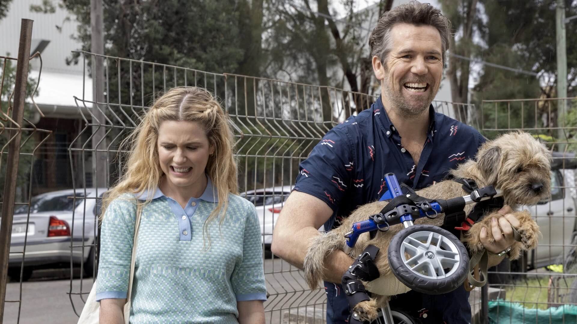 Patrick Brammall and Harriet Dyer in a dog park in 'Colin From Accounts'