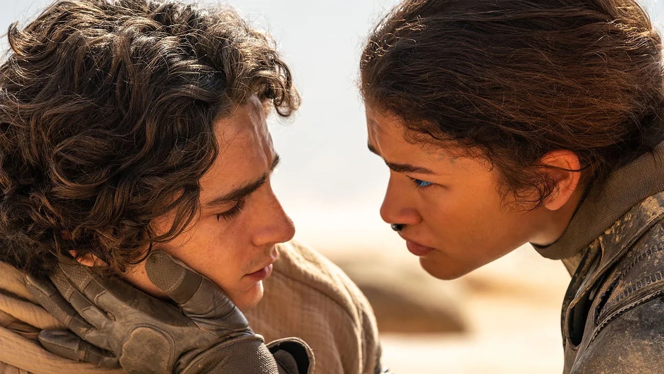 Paul (Timothée Chalamet) and Chani (Zendaya) looking longingly at each other in 'Dune: Part Two'
