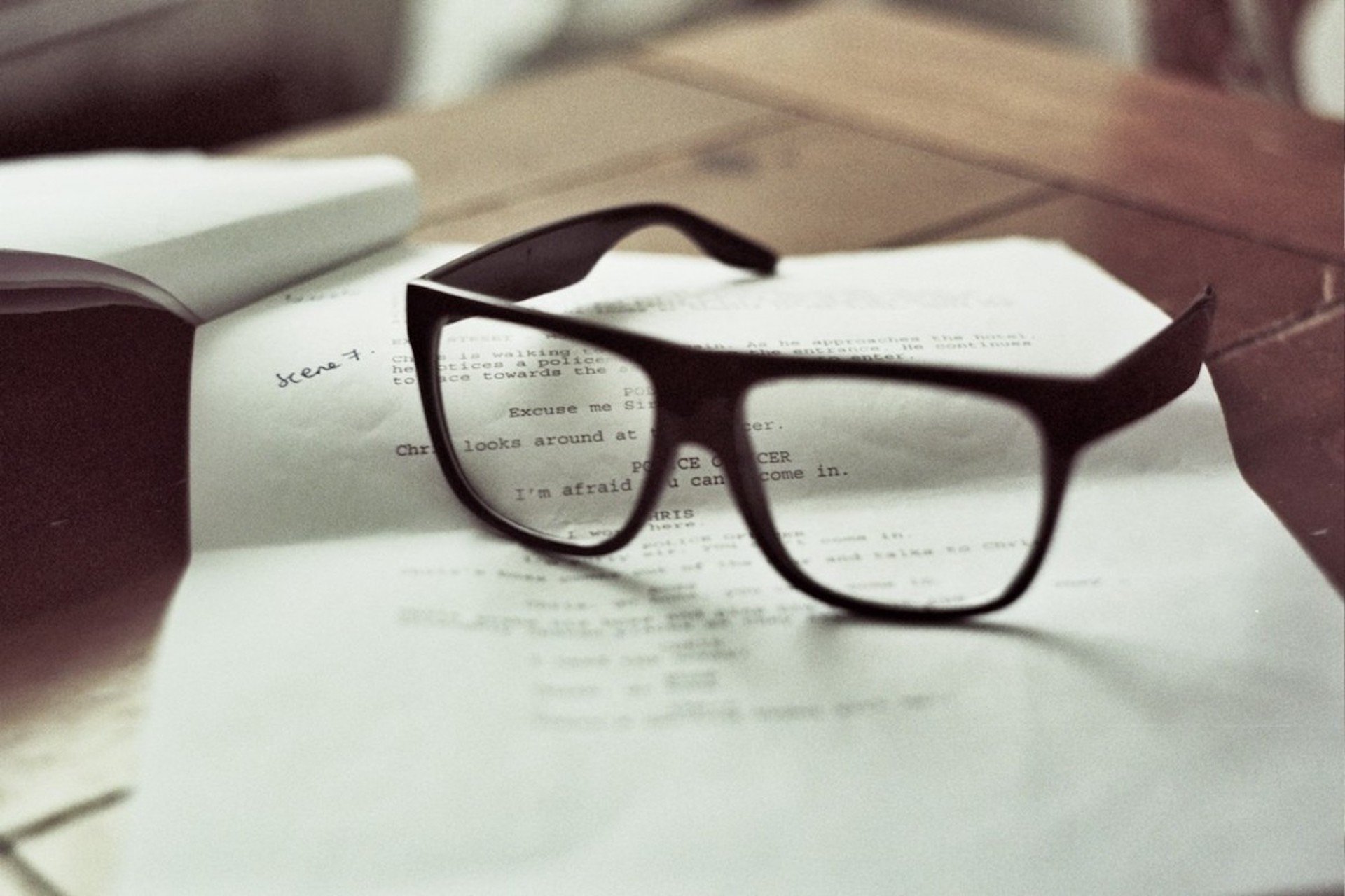 Glasses on a screenplay page, How to Present Your Screenplay to the Industry