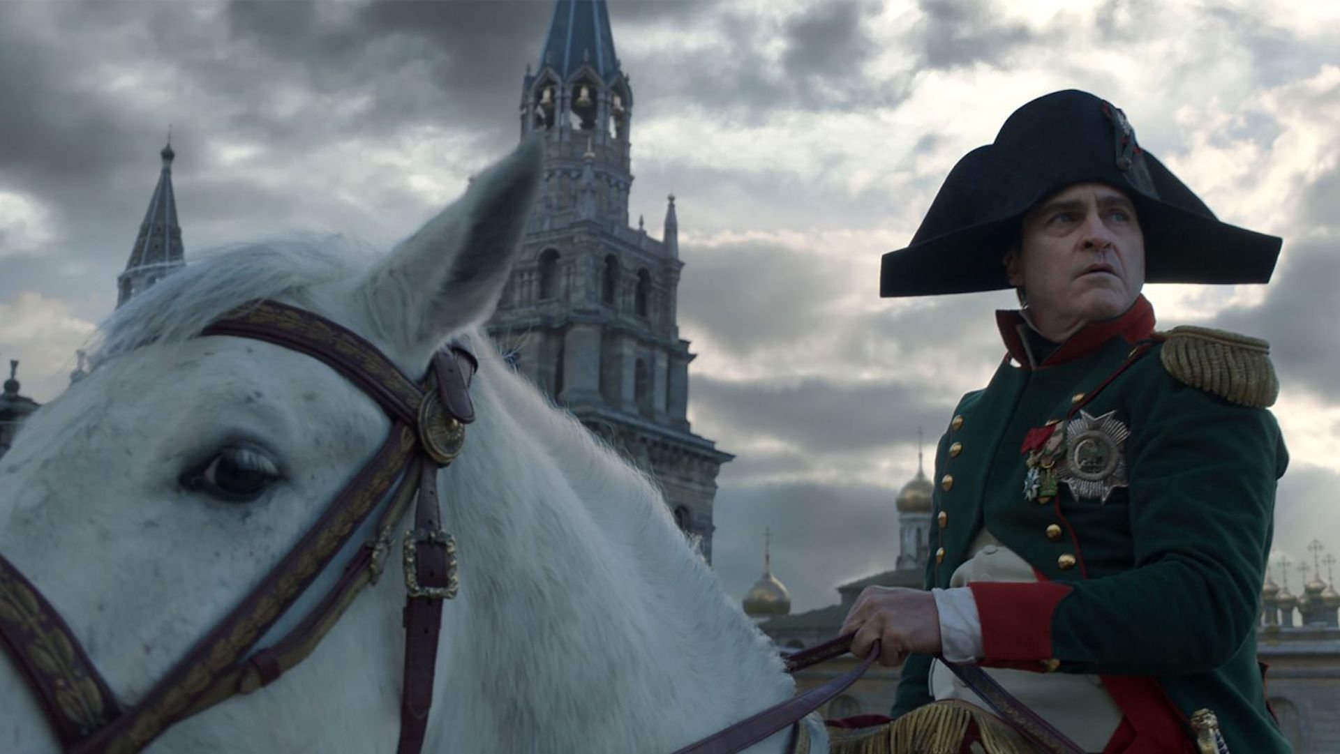 Napoleon Bonaparte (Joaquin Phoenix) on top of a horse in 'Napoleon,' 5 Ways To Write a Modern Biopic 