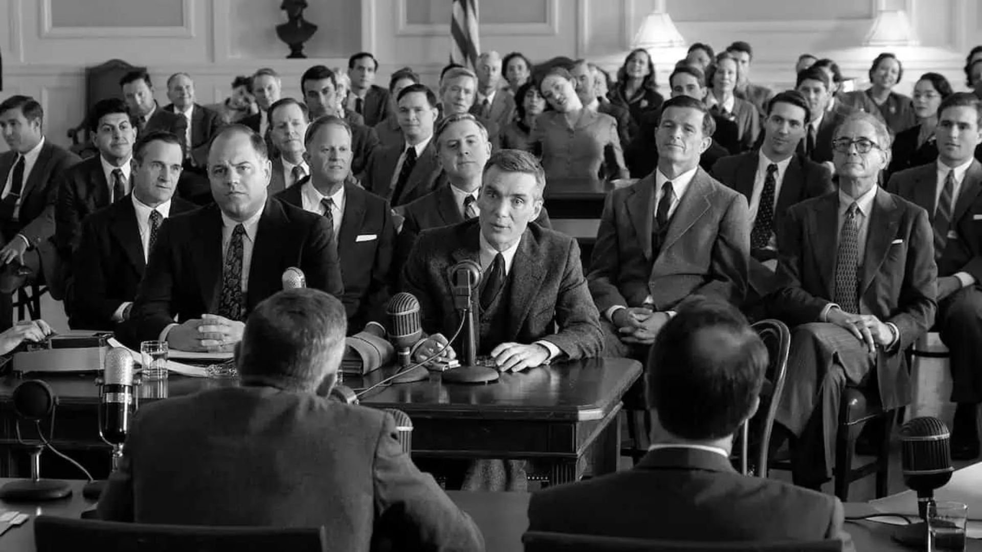 Cillian Murphy as J. Robert Oppenheimer in an official Congress hearing in 'Oppenheimer'